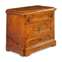 A Continental Figured Birch Commode