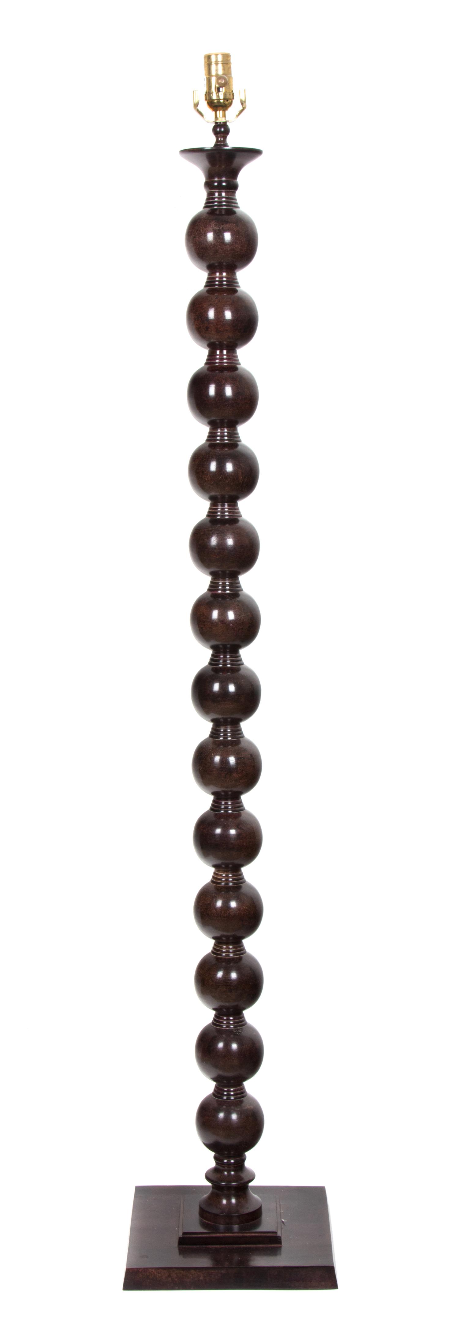 A Patinated Bronze Floor Lamp Height 65 1/2 inches. — 20TH CENTURY