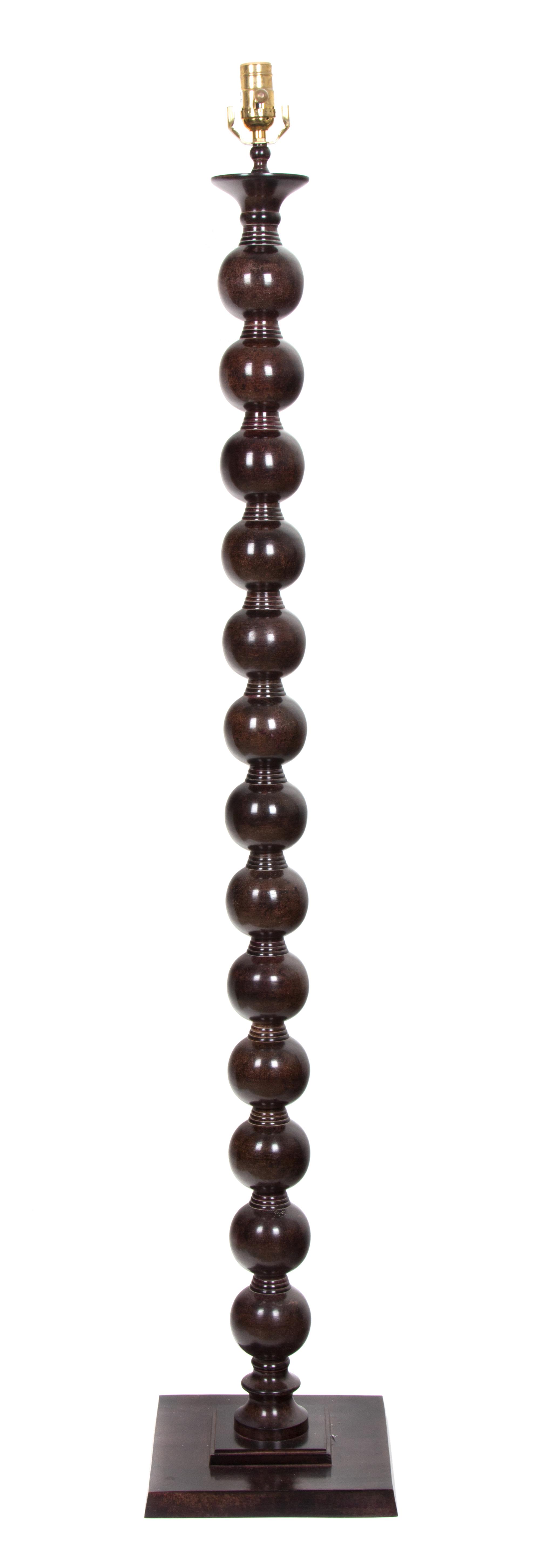 A Patinated Bronze Floor Lamp Height 65 1/2 inches. — 20TH CENTURY