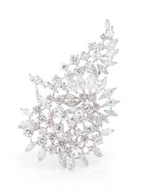 A Platinum and Diamond Spray Brooch, 15.60 dwts.