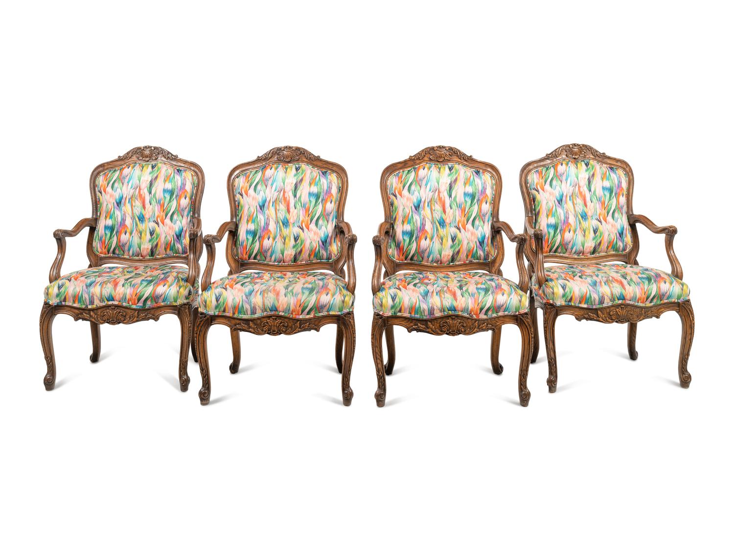 A Set of Four Interior Crafts Louis XV Style Oak Fauteuils