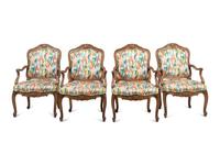 A Set of Four Interior Crafts Louis XV Style Oak Fauteuils