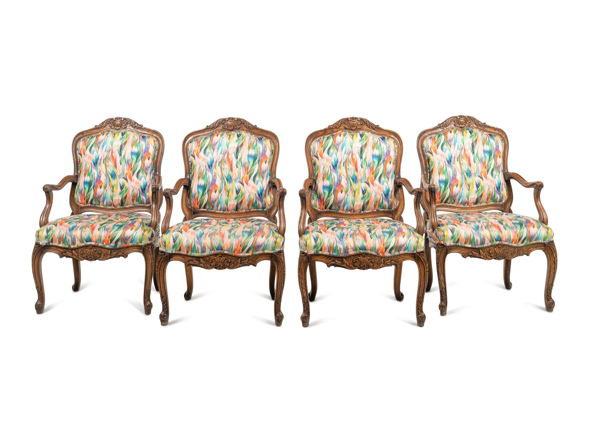 A Set of Four Interior Crafts Louis XV Style Oak Fauteuils