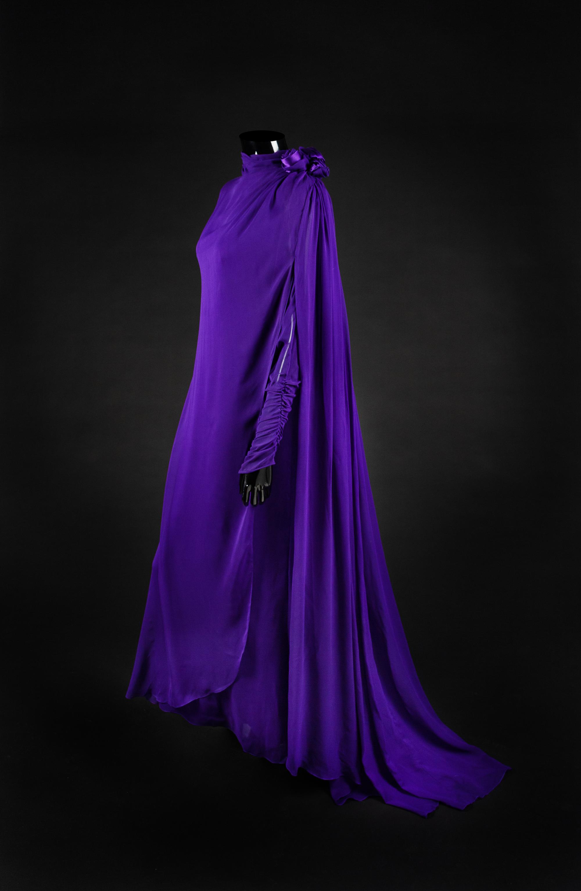 Dress, Earrings and Bag, 1987. Dress designed by Paul Zastupnevitch and made by Western Costume Company in Los Angeles — Worn by Olivia de Havilland at the Golden Globes Awards in 1987 to accept a Golden Globe Award for Best Supporting Actress in a Series, Mini Series or Motion Picture made for TV for her role in ‘Anastasia: The Mystery of Anna’.