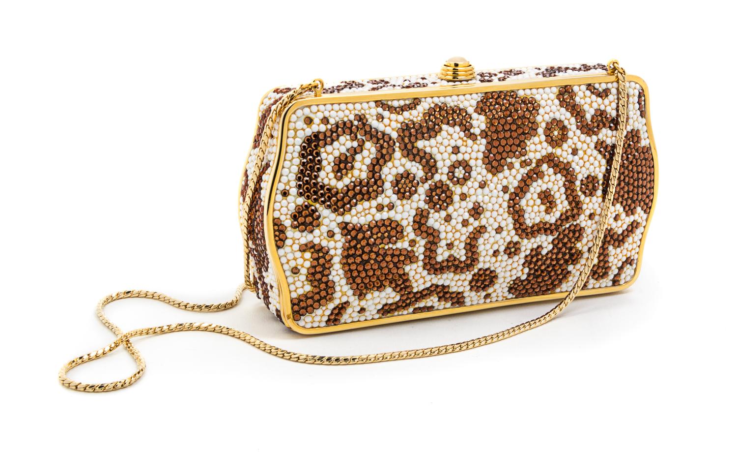 A Judith Leiber Brown and Ivory Swarovski Crystal Minaudiere, 6 1/2 x 4 x 1 1/2 inches.