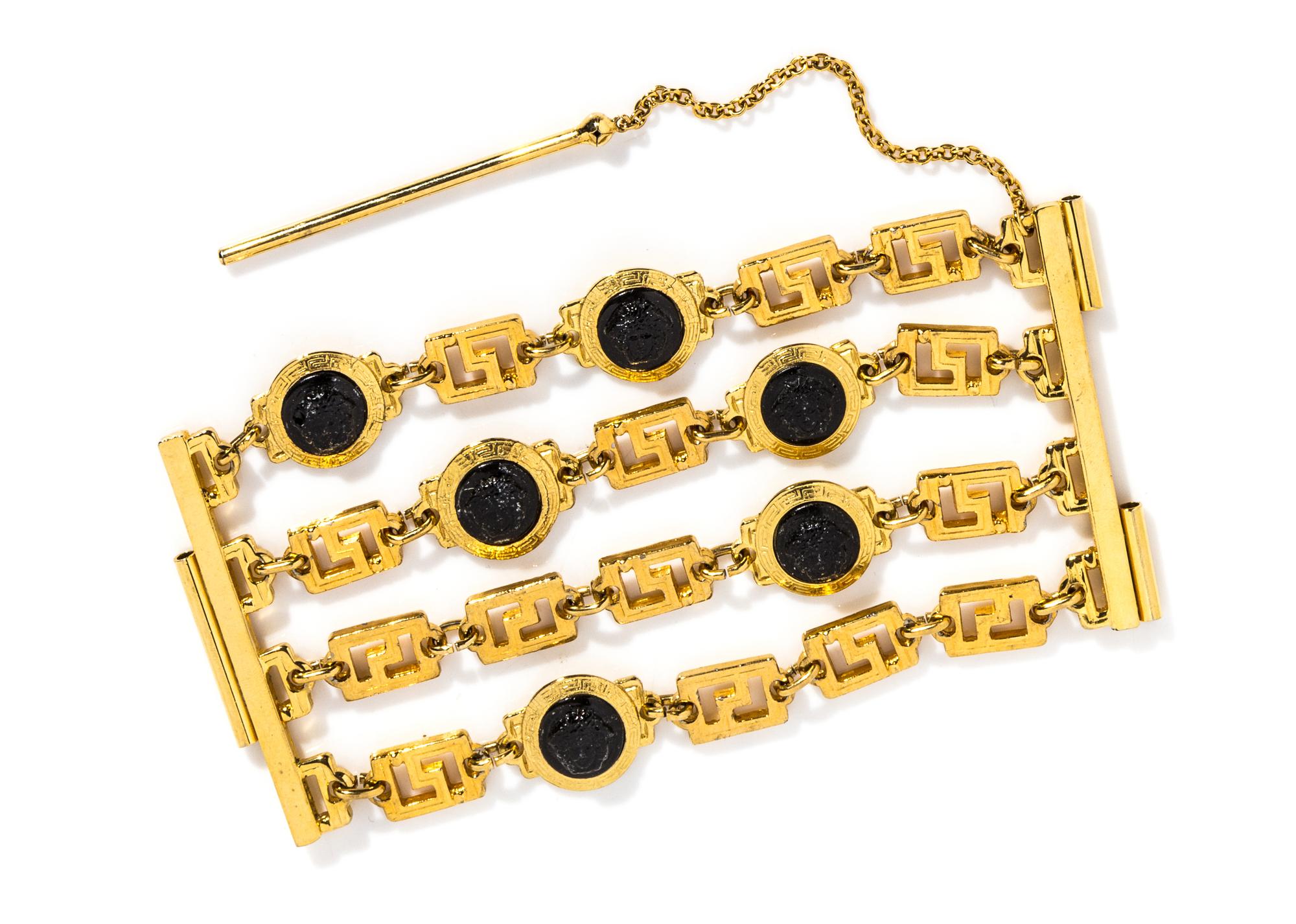 A Gianni Versace Four Strand Greco Link Bracelet, 7.5" x 3.25".