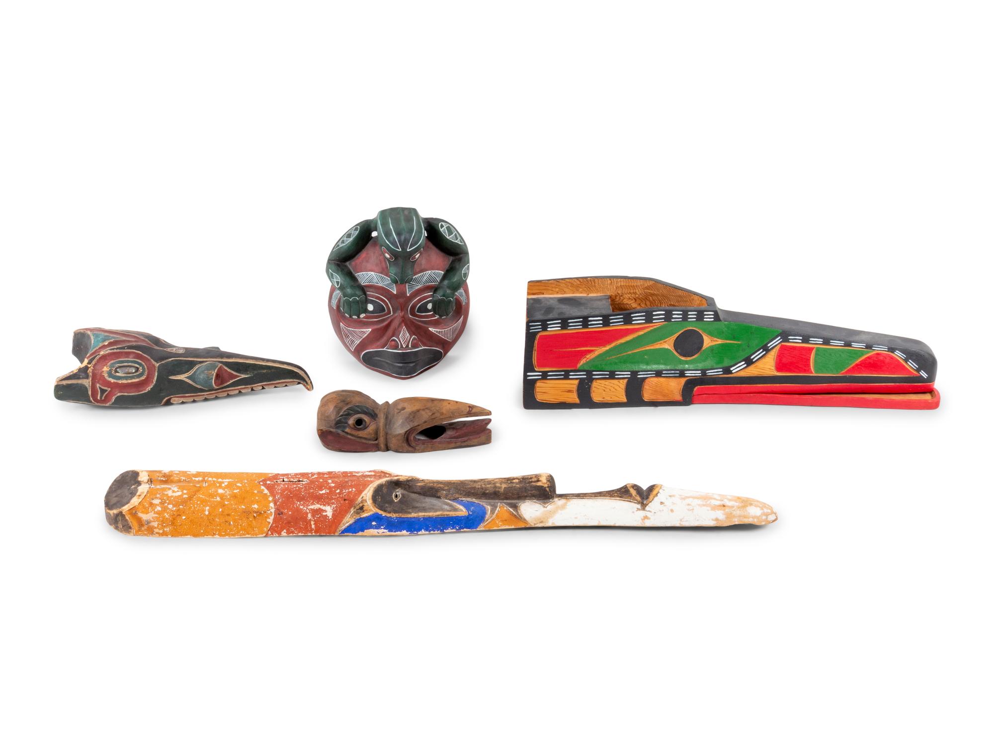 A Group of Carved Wooden Tribal Masks