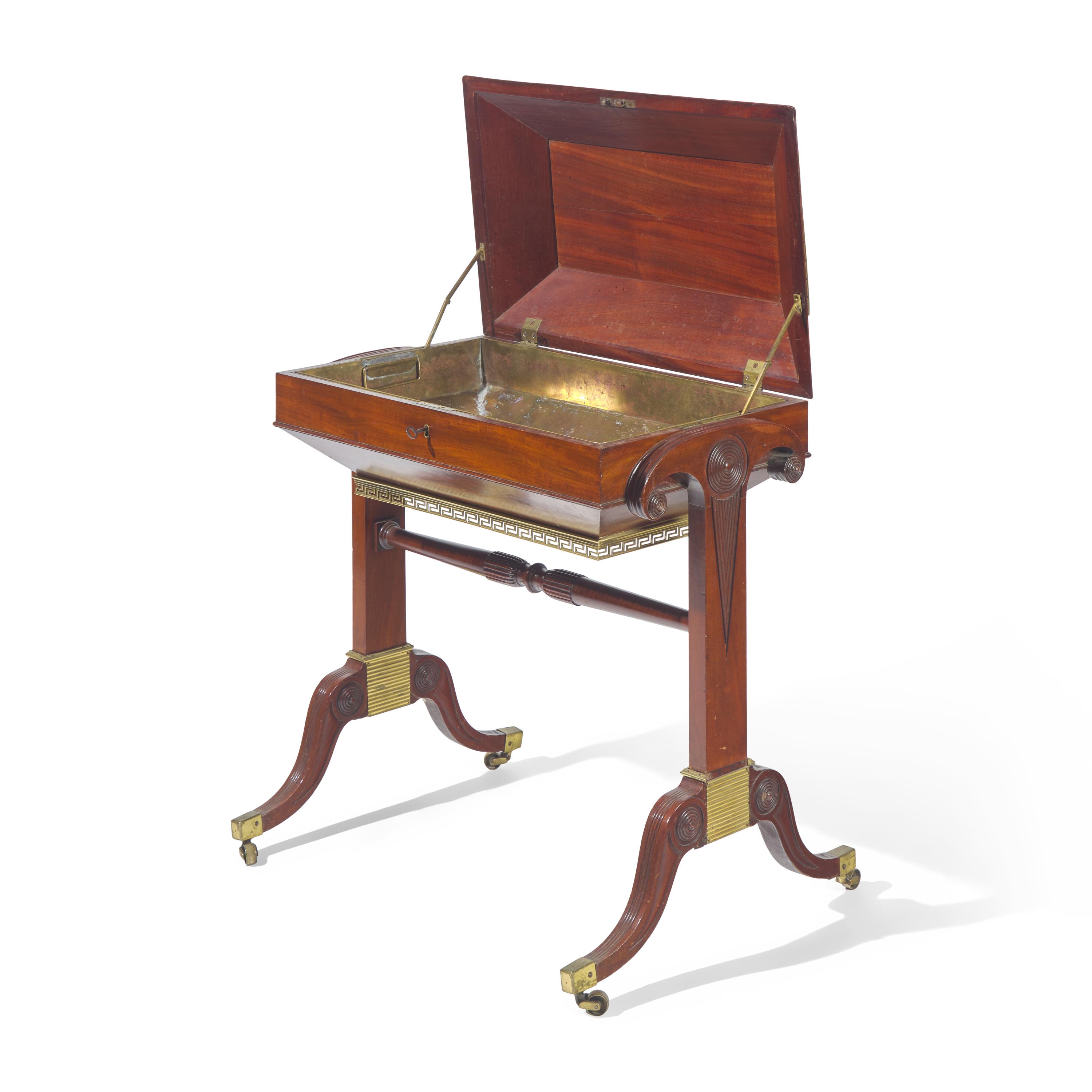 A Neoclassical Pierced Brass Mounted Mahogany Cellarette