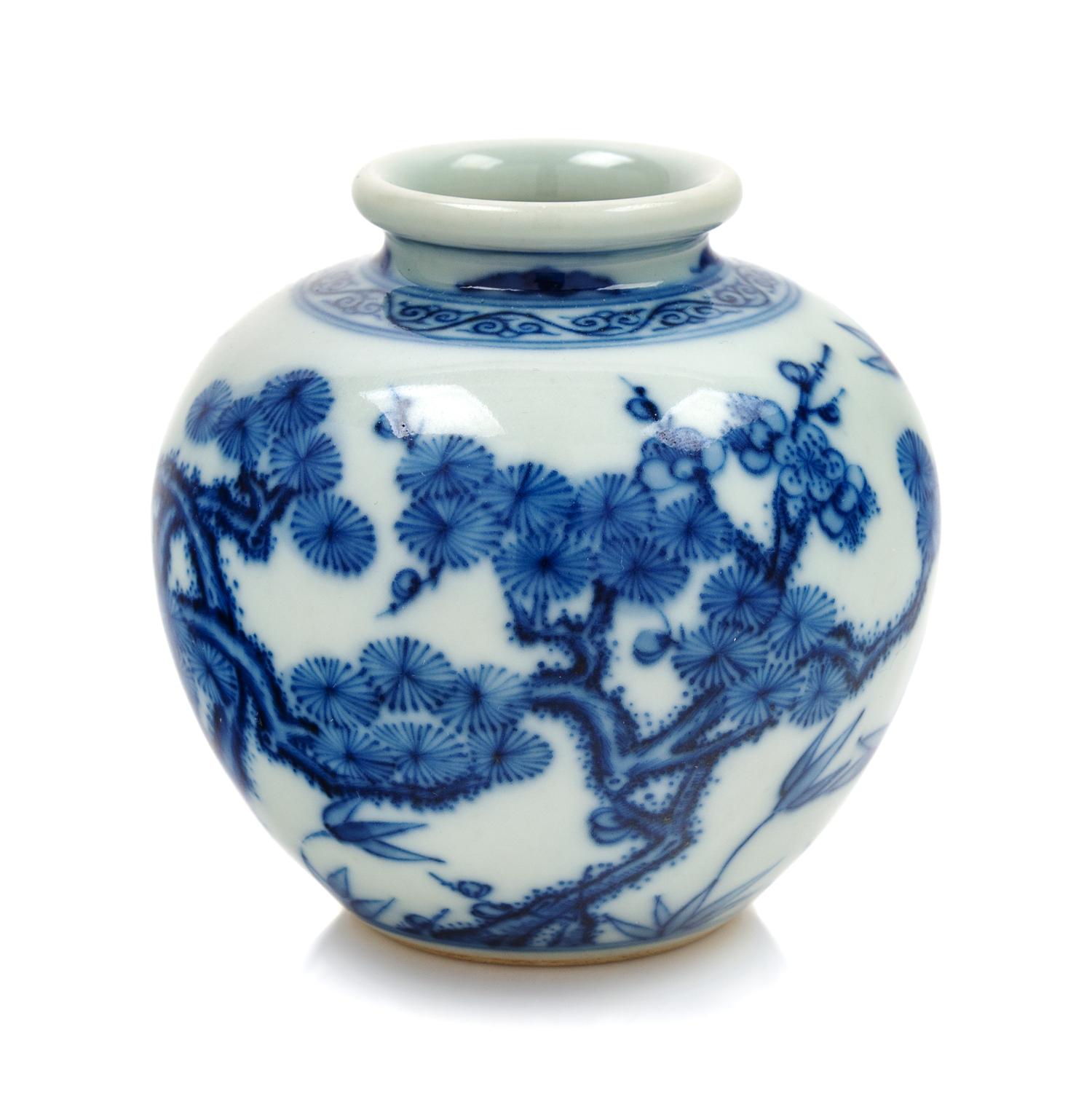 A Blue and White Porcelain 'Truncated Plum' Vase Height 3 1/4 inches.