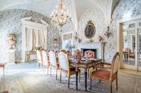 An Italian Painted and Parquetry Mahogany-Top Dining Table