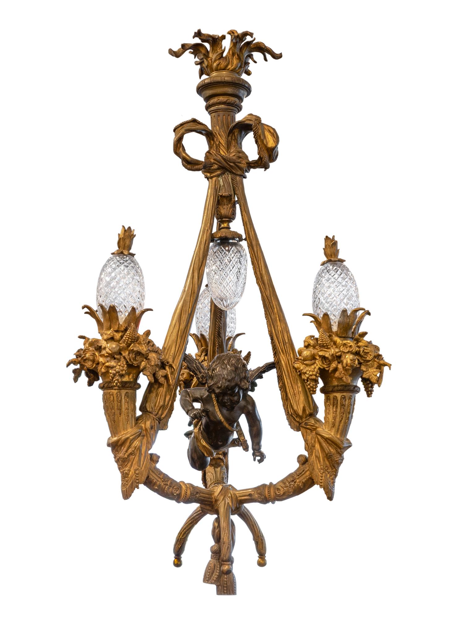A Louis XVI Style Gilt Bronze and Cut Crystal Three-Light Chandelier — 19TH CENTURY