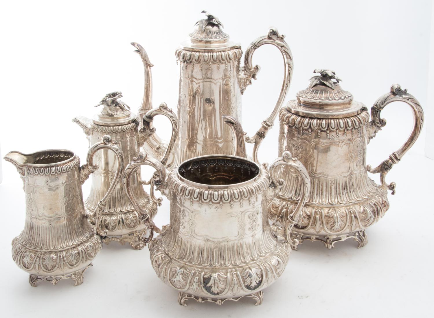 An English Silver-Plate Teapot and Coffee Pot Height of tallest 11 3/4 inches.