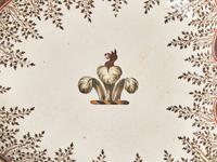 An English Creamware Part Dinner Service Bearing an Armorial Crest
