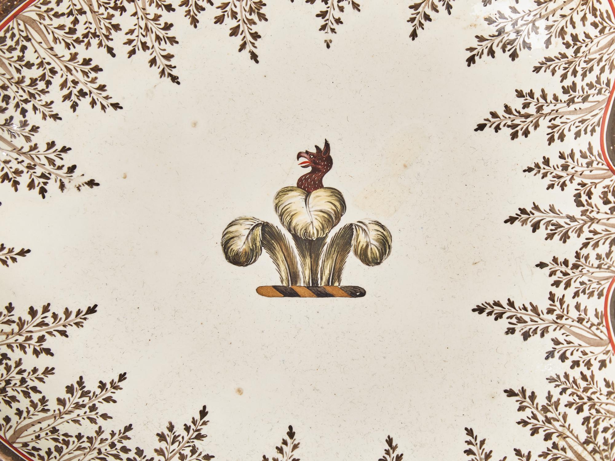 An English Creamware Part Dinner Service Bearing an Armorial Crest