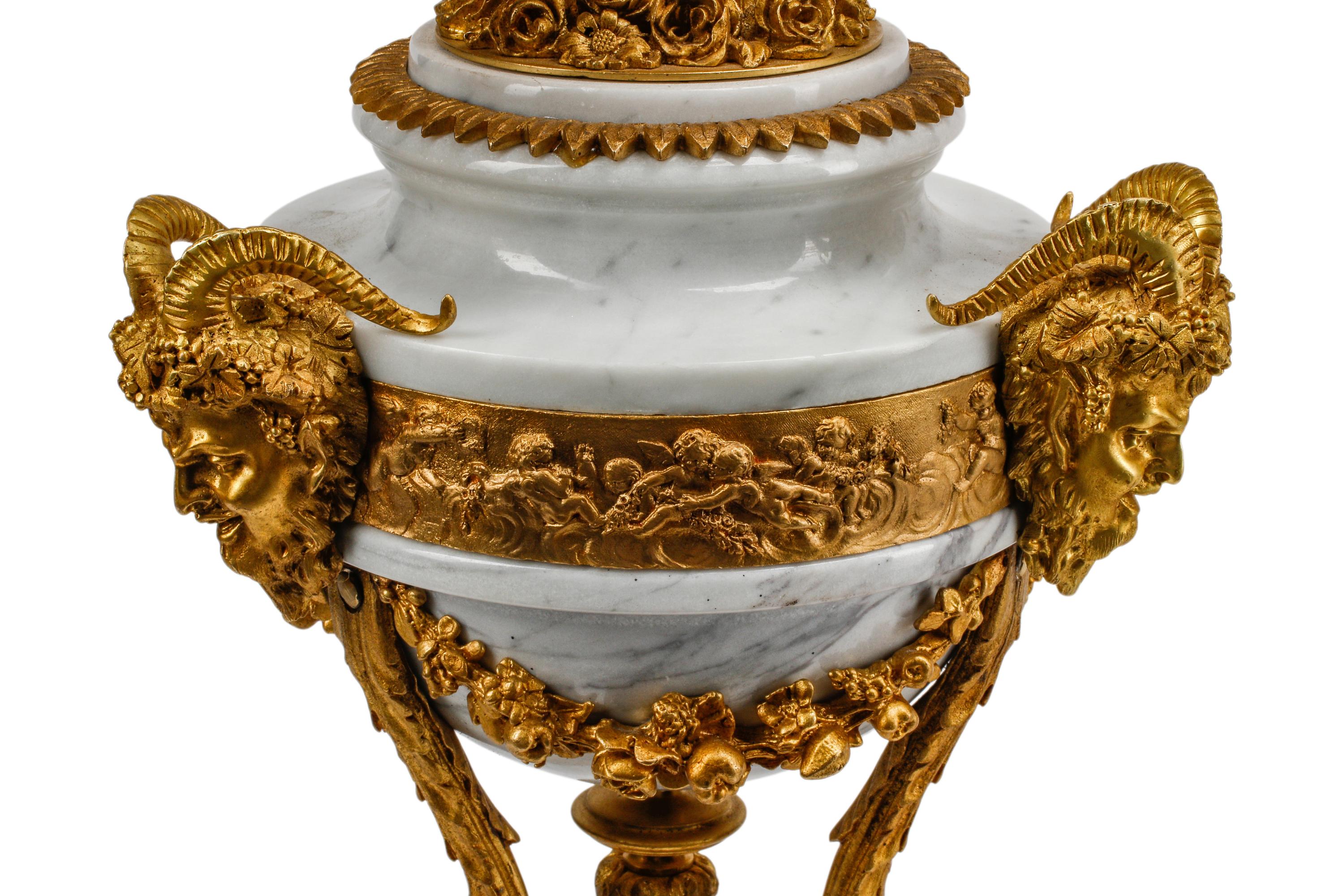A Pair of Louis XV Style Gilt Bronze and Marble Seven-Light Candelabra