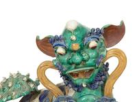 A Pair of Chinese Glazed Ceramic Foo Dogs