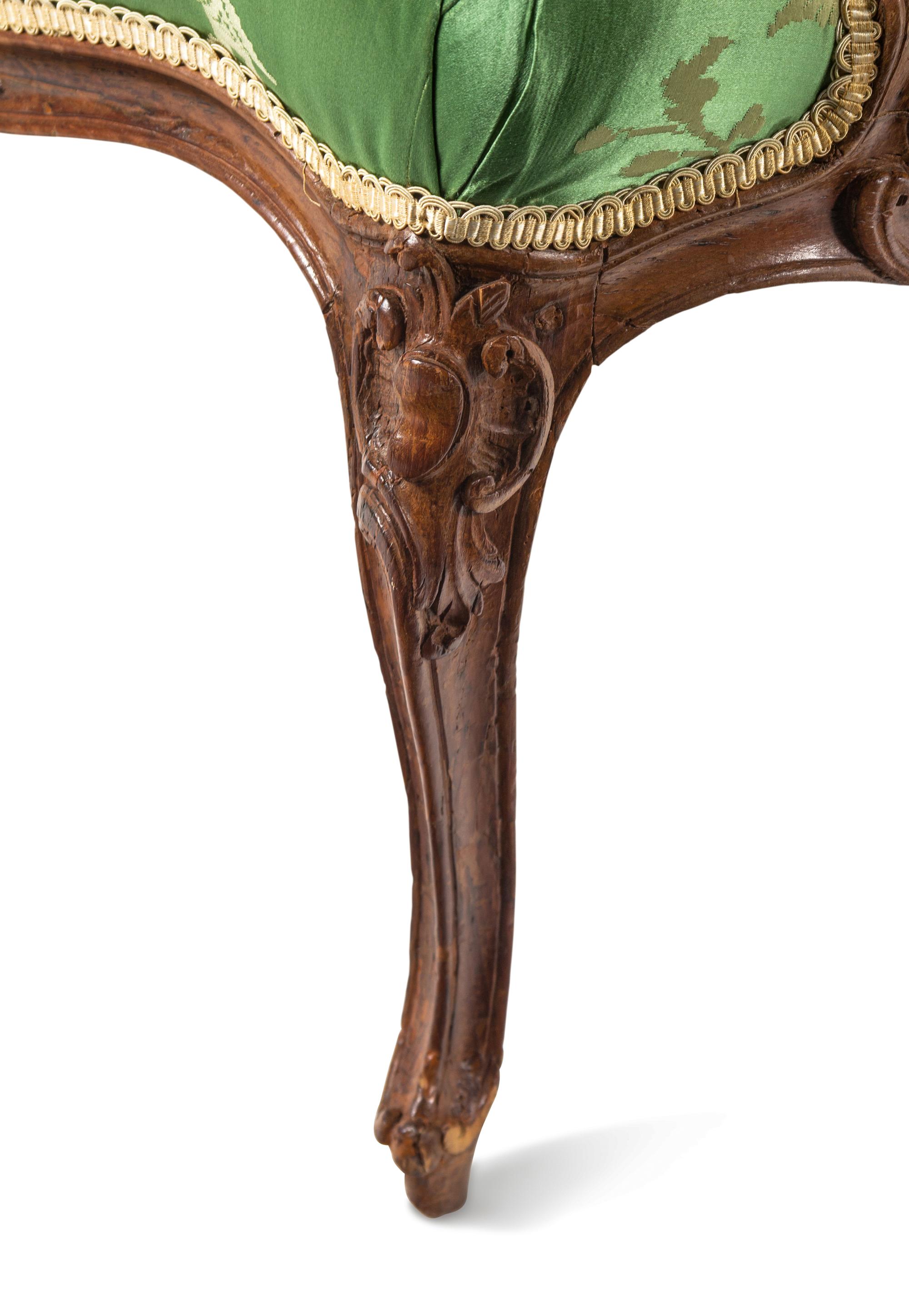 A Pair of Louis XV Beechwood Fauteuils