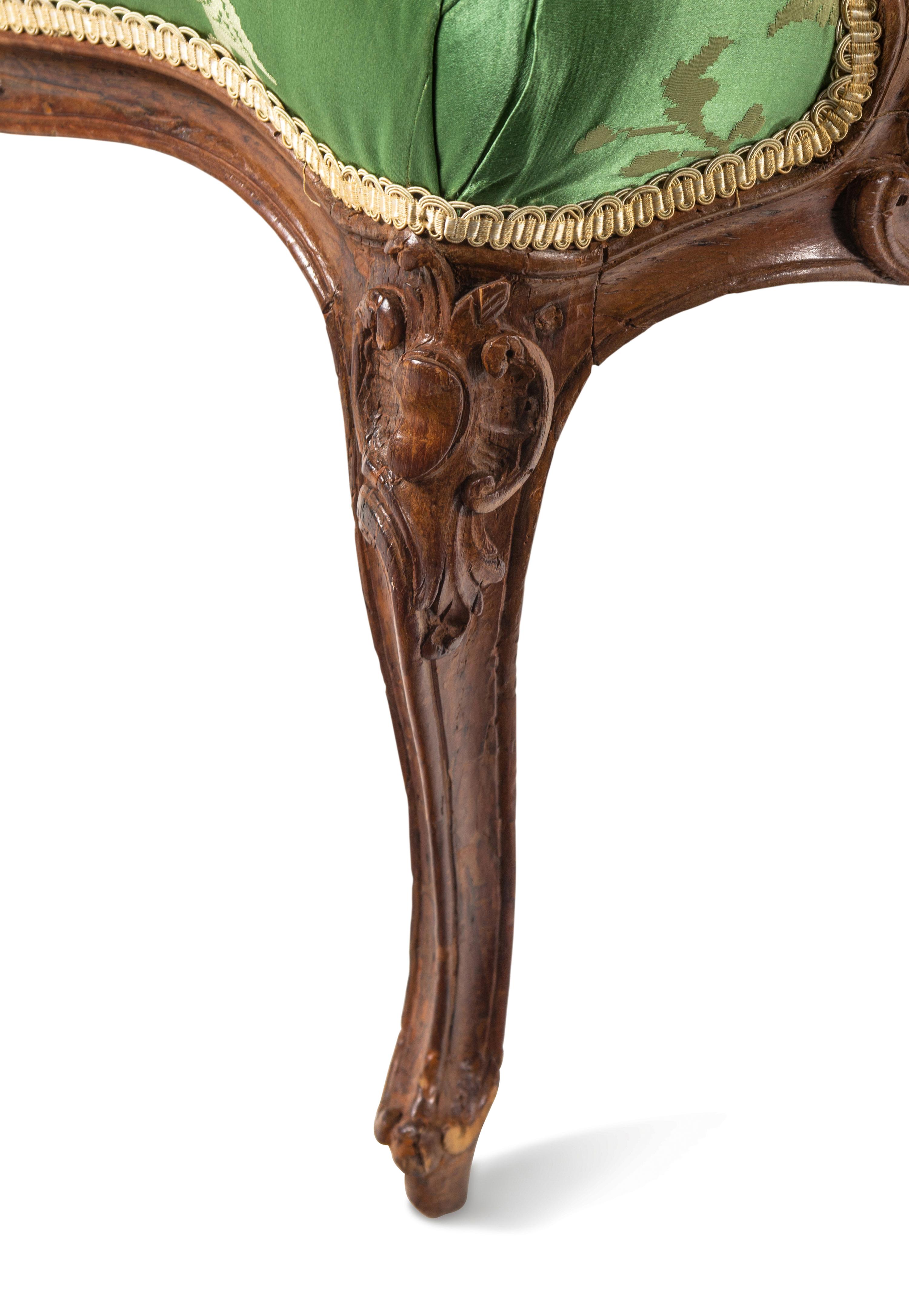 A Pair of Louis XV Beechwood Fauteuils