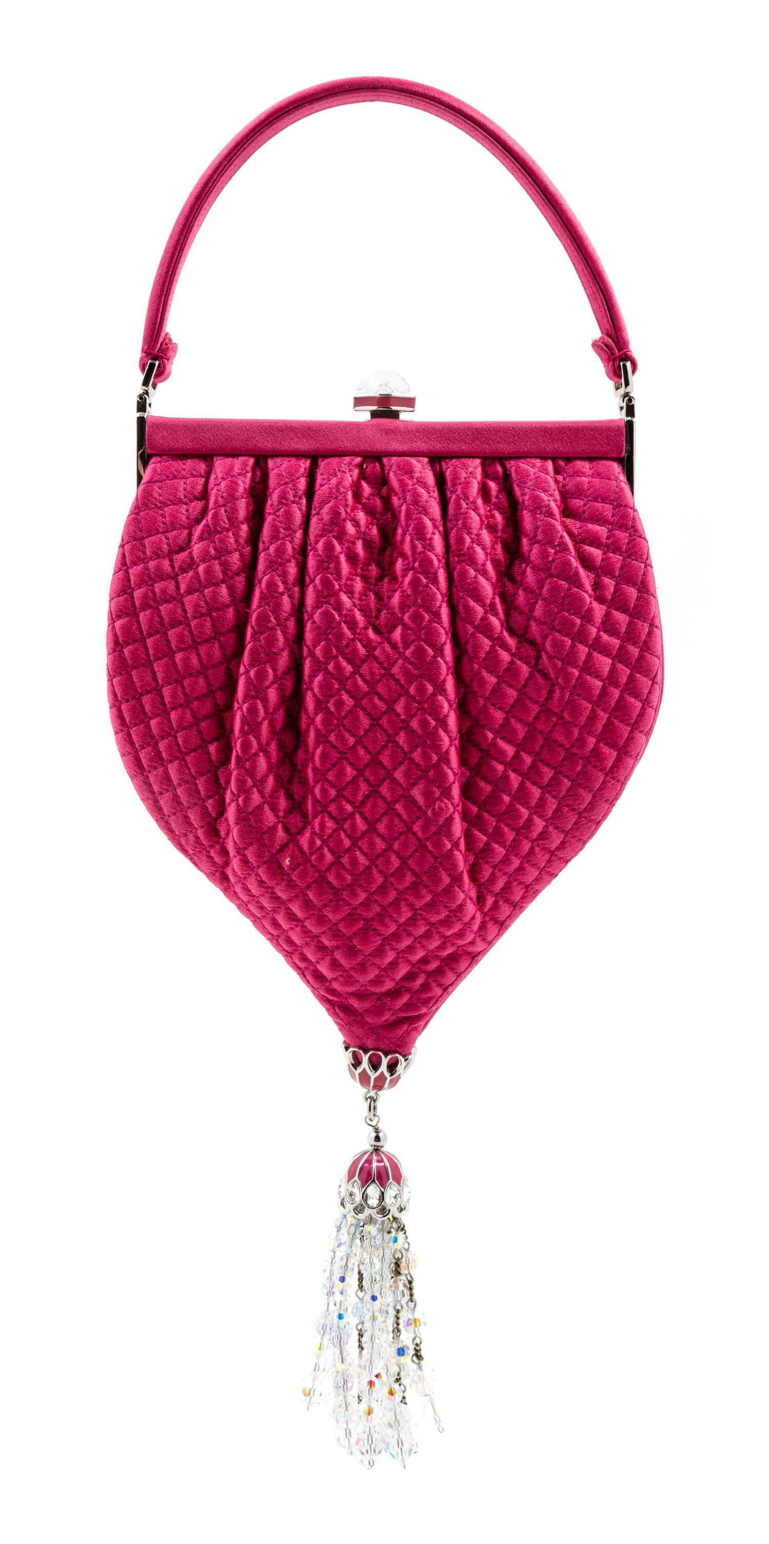 A Judith Leiber Pink Satin Quilted Handbag, 5.5" x 10" x 1"; Handle drop: 3".