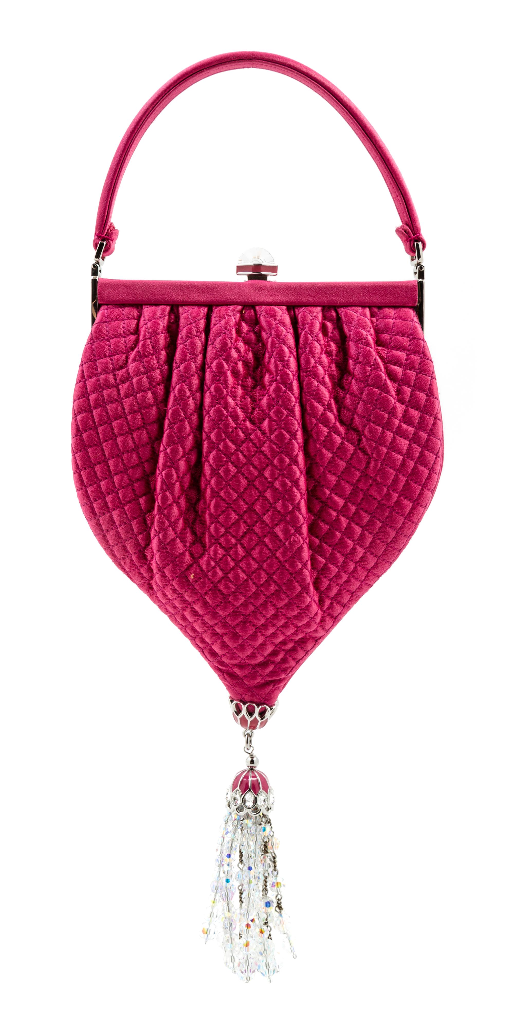 A Judith Leiber Pink Satin Quilted Handbag, 5.5" x 10" x 1"; Handle drop: 3".