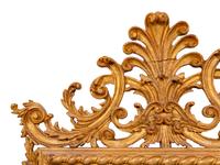An Italian Baroque Style Giltwood Mirror