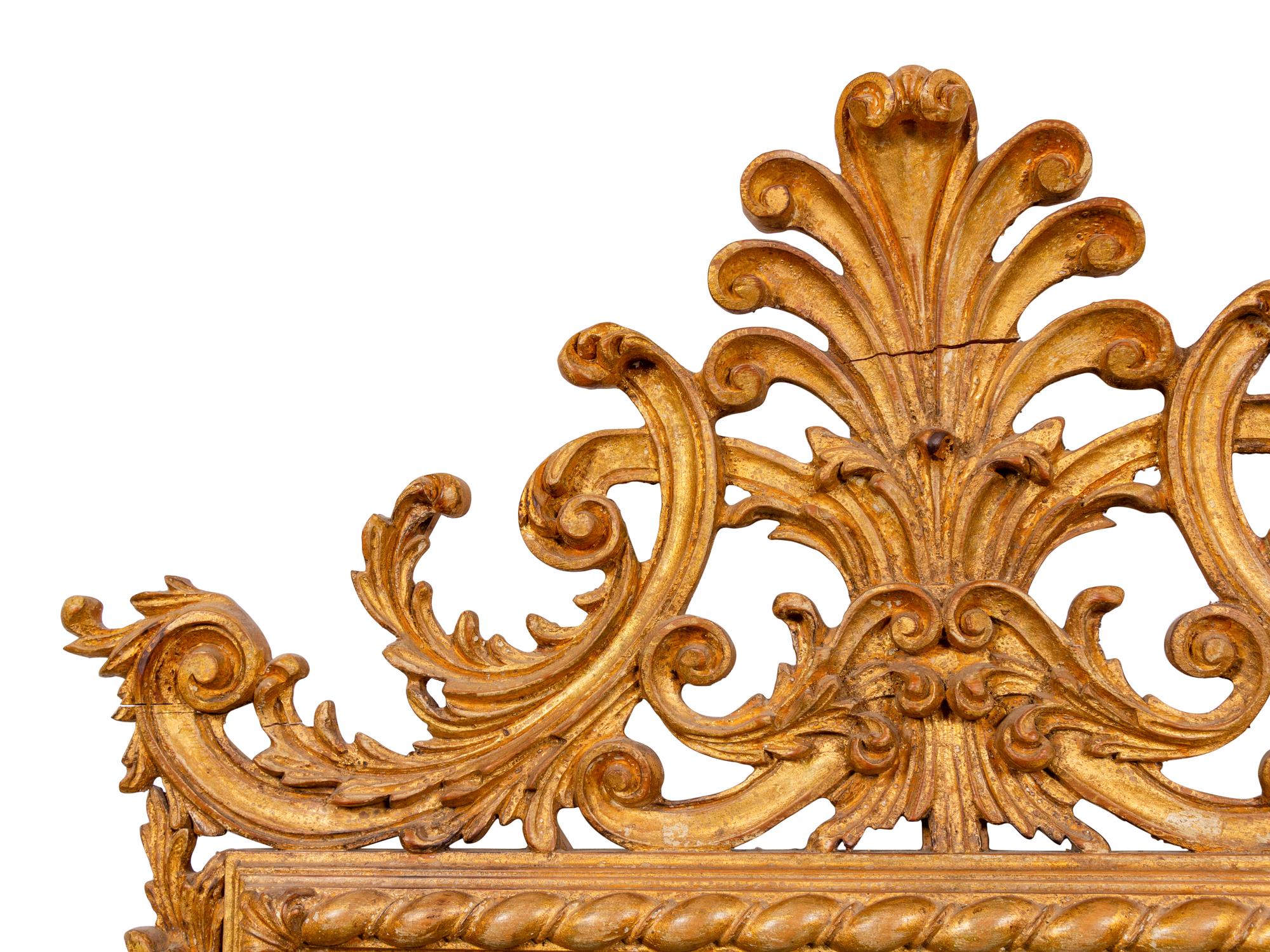 An Italian Baroque Style Giltwood Mirror