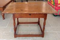 An American Lacquered Pine Table Height 24 x width 36 x depth 23 1/2 inches. — EARLY 20TH CENTURY