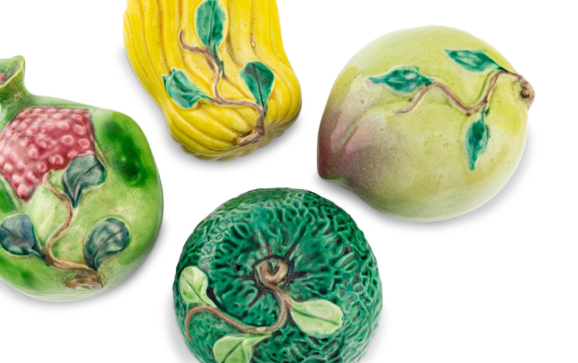 A Set of Four Chinese Glazed Terracotta Fruits