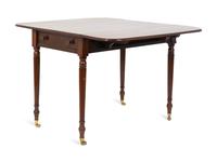 A Regency Mahogany Drop Leaf Table — 19TH CENTURY