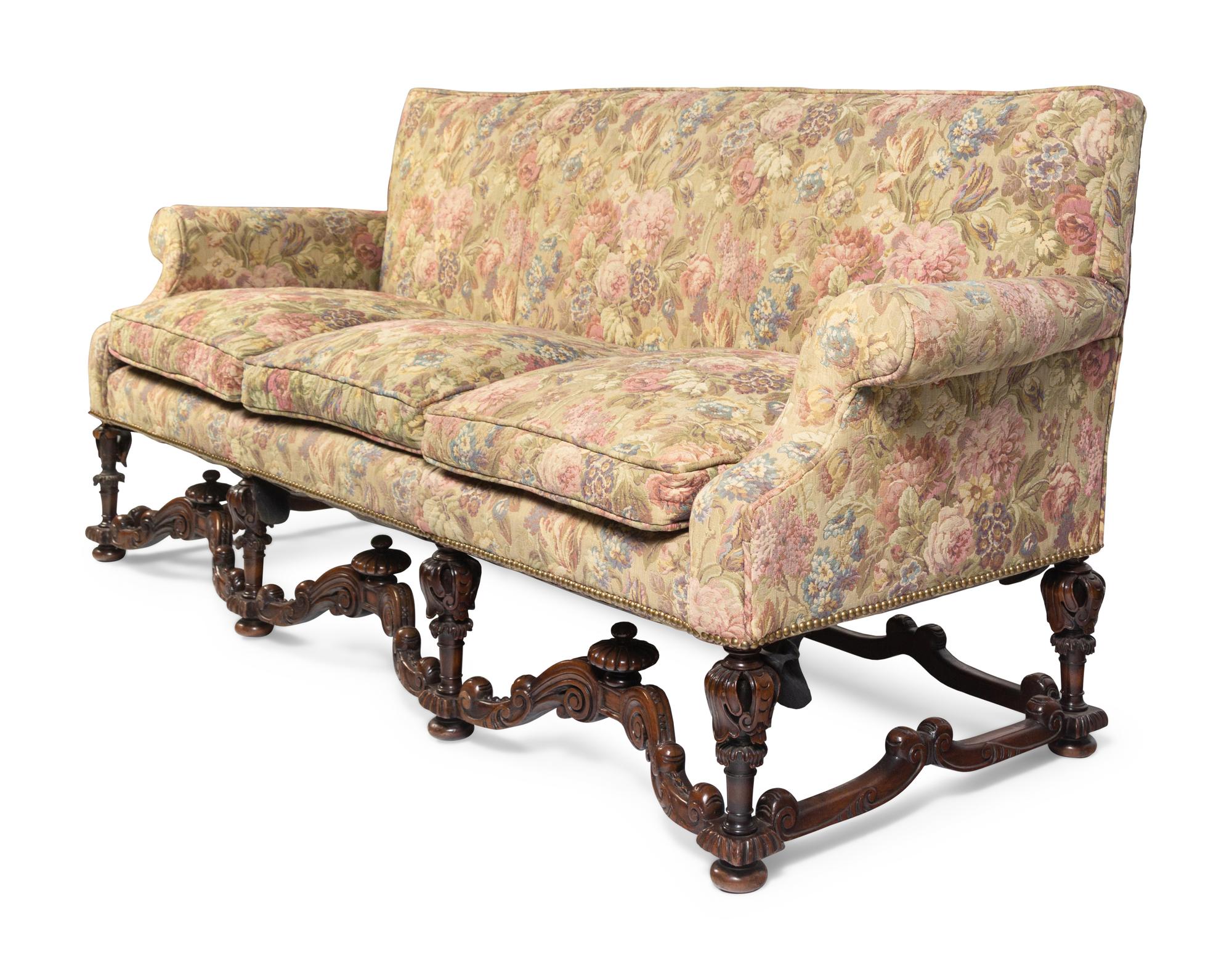 A William and Mary Style Carved Walnut Sofa