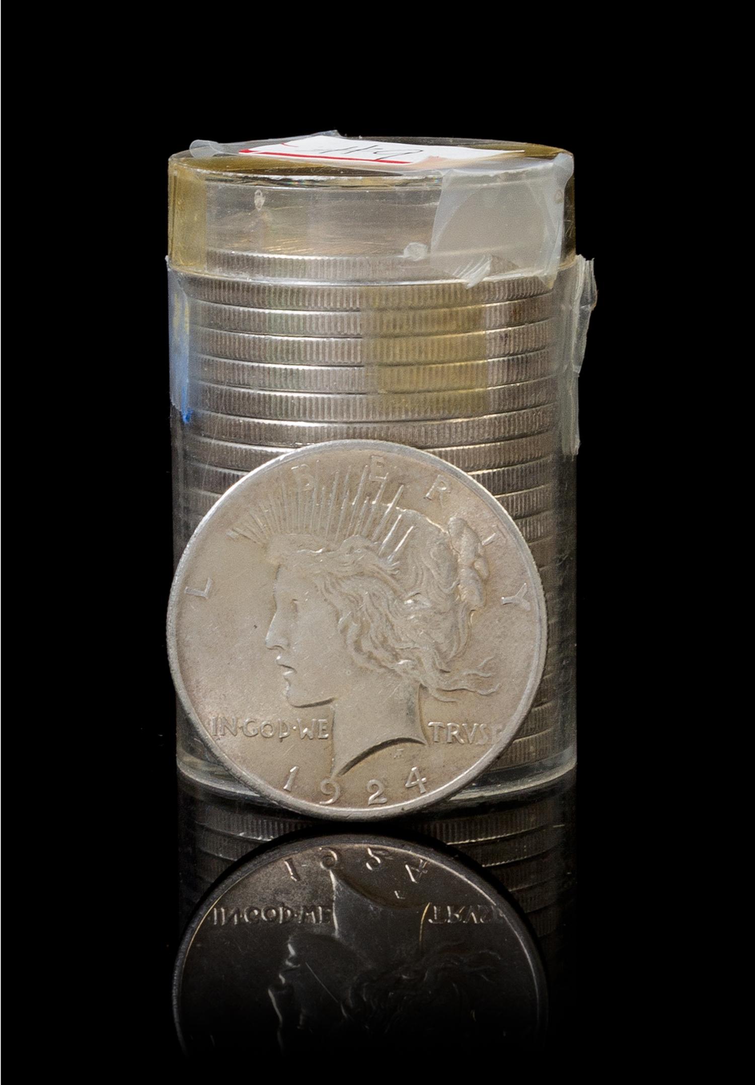 A Group of Twenty United States 1924 Peace Silver Dollars