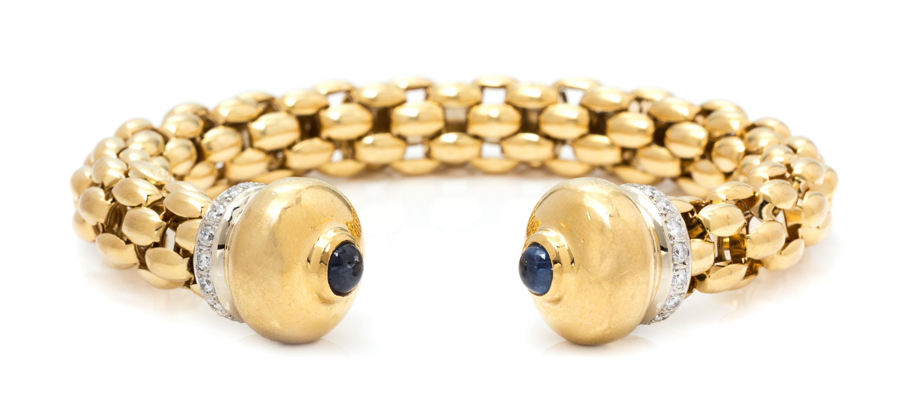 An 18 Karat Gold, Sapphire and Diamond Cuff Bracelet, FOPE, 33.60 dwts.