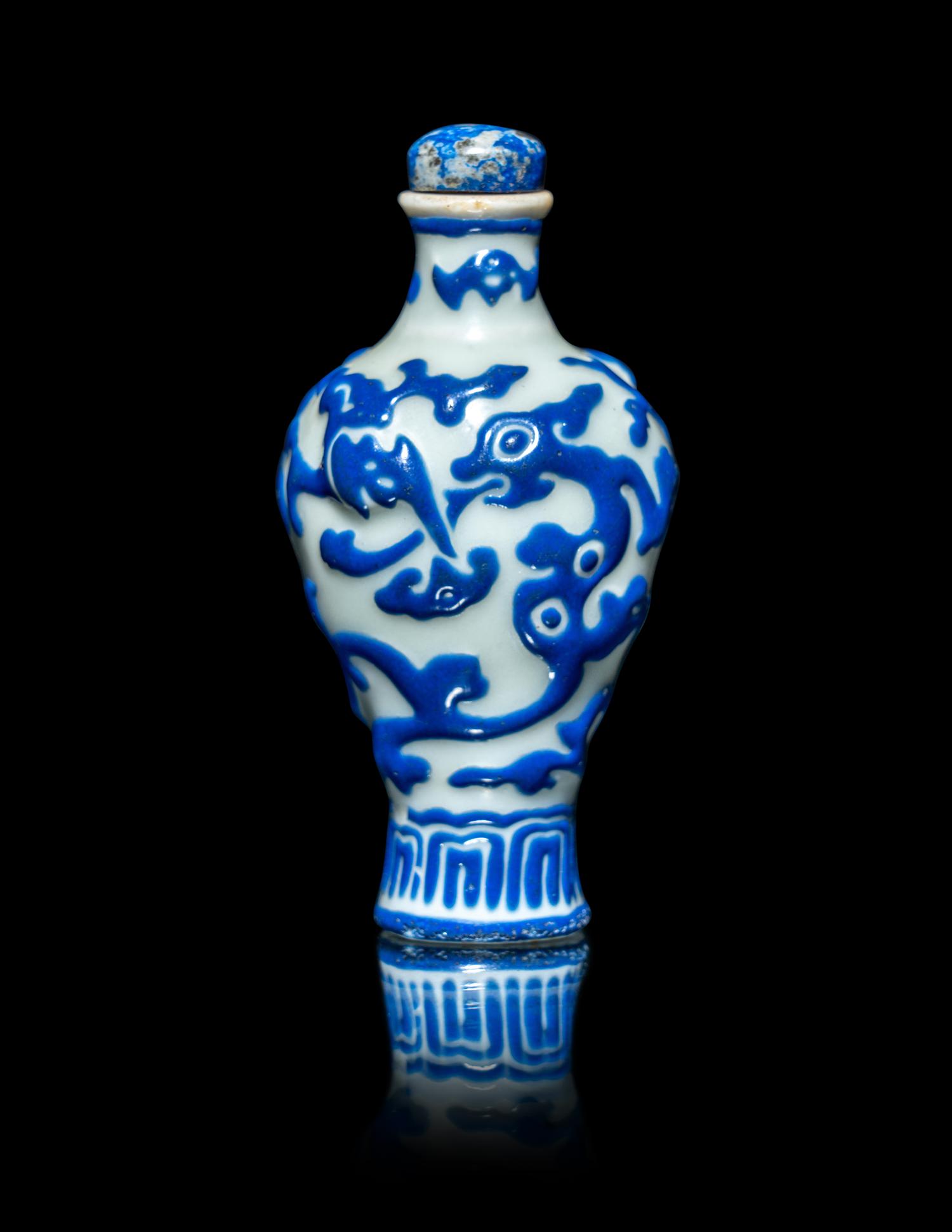 A Chinese Blue and White Enameled Molded Porcelain Snuff Bottle
