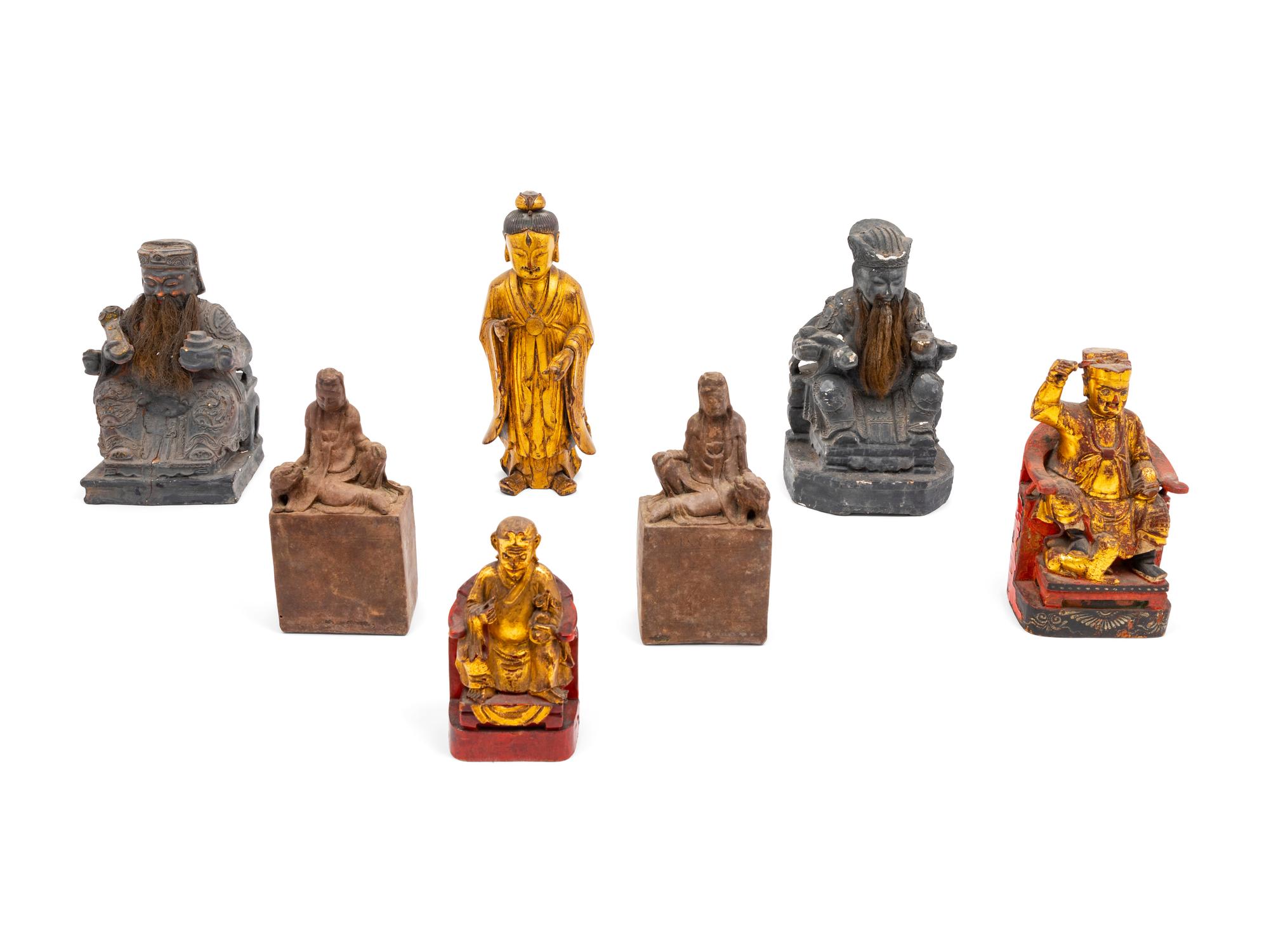 A Group of Carved Chinese Figures and Panels
