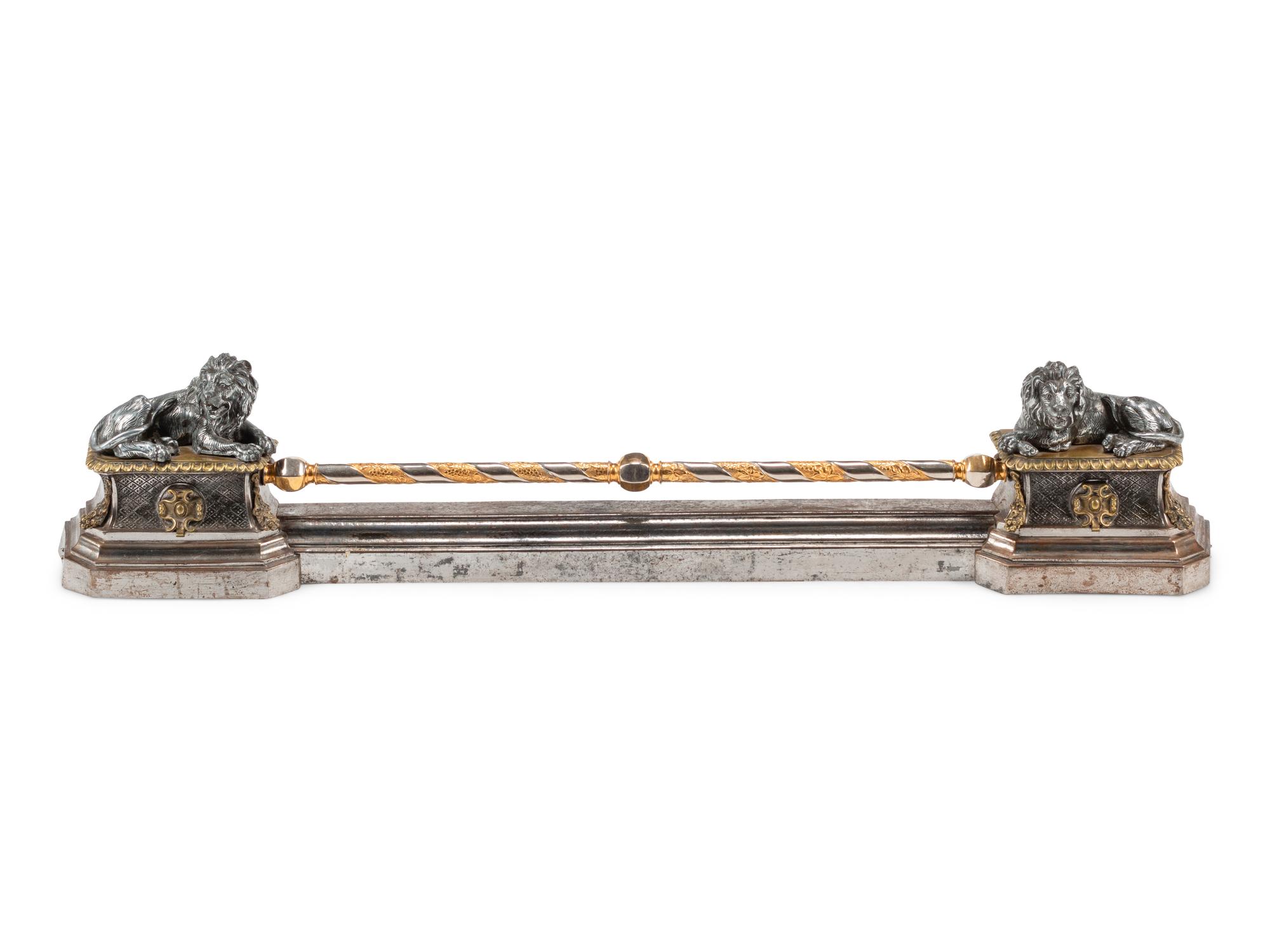 A Continental Steel and Gilt Bronze Fire Fender