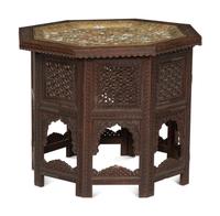 An Anglo-Indian Carved Teak Octagonal Folding Table with Inset Brass Tray Top
