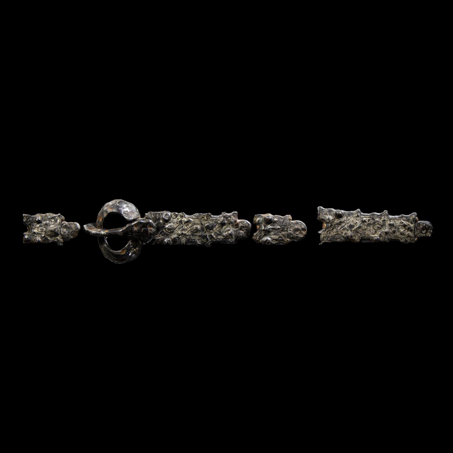 Five Migration Period Iron and Silver Belt Attachments