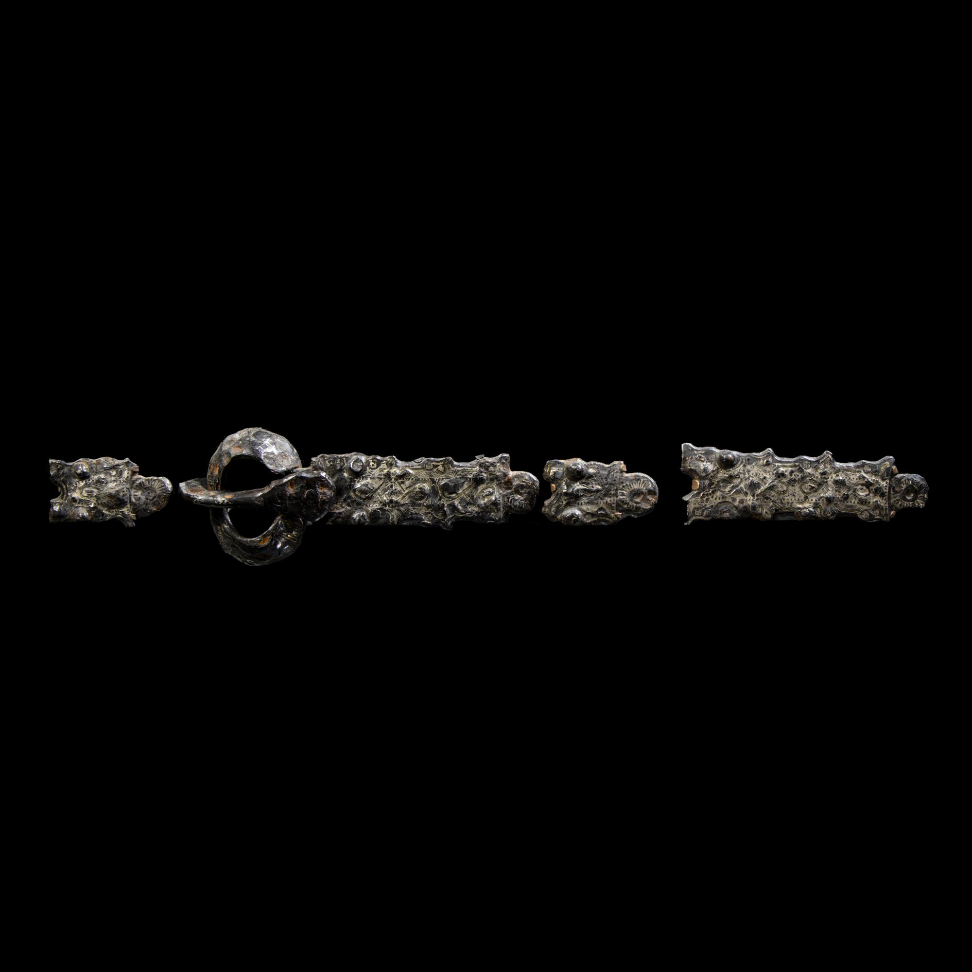 Five Migration Period Iron and Silver Belt Attachments
