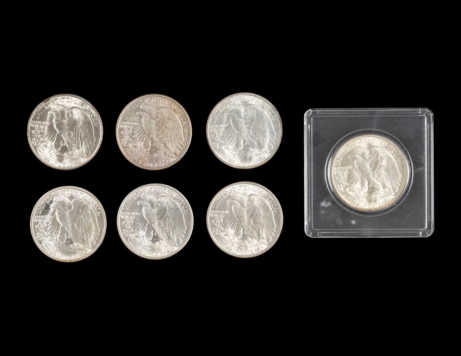 A Group of Seven Walking Liberty 50c Coins