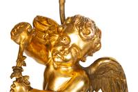 A Pair of Louis XVI Style Six-Light Giltwood Figural Candelabra