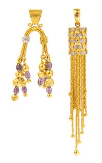 A Collection of 21 Karat White and Yellow Gold Pendants, 29.00 dwts.