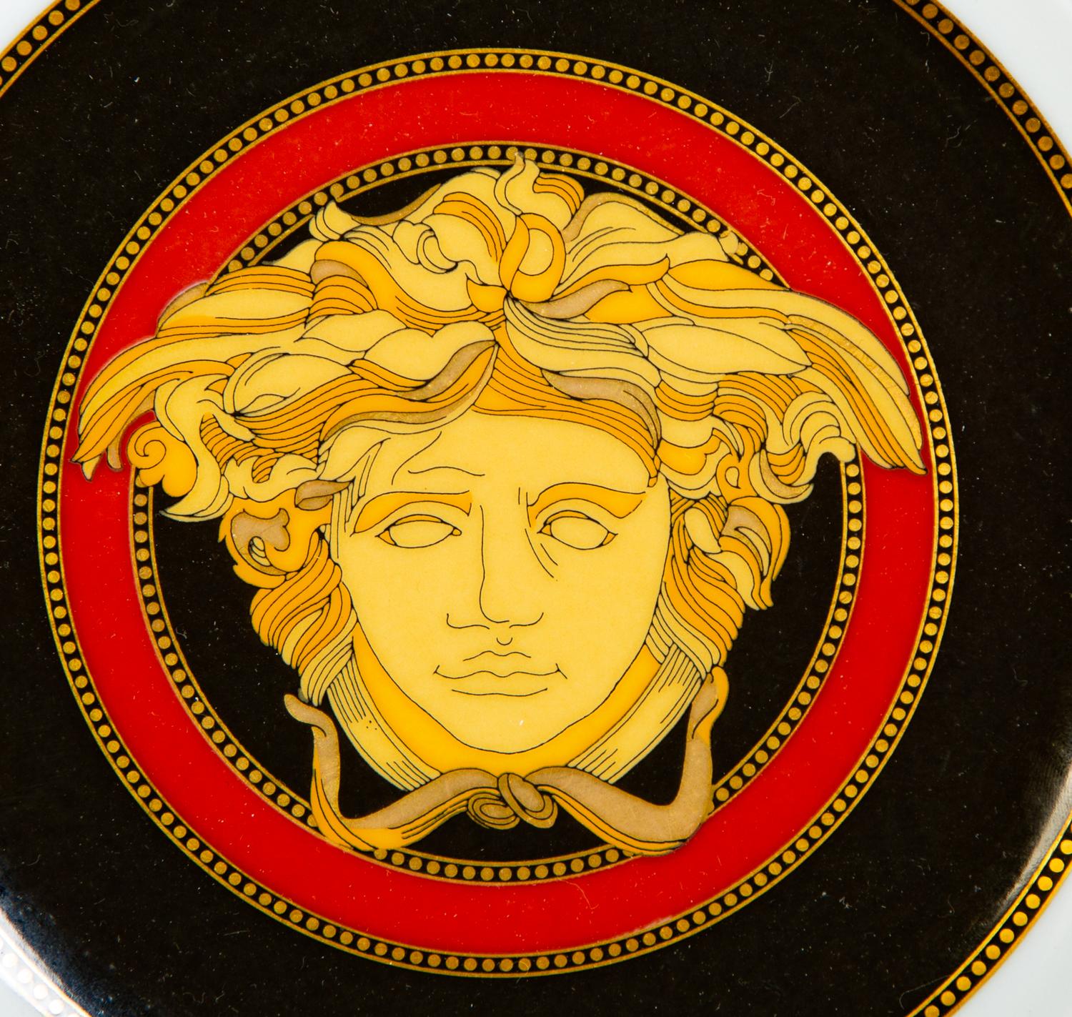 A Versace Porcelain Medusa Red Dinner Service