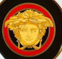 A Versace Porcelain Medusa Red Dinner Service