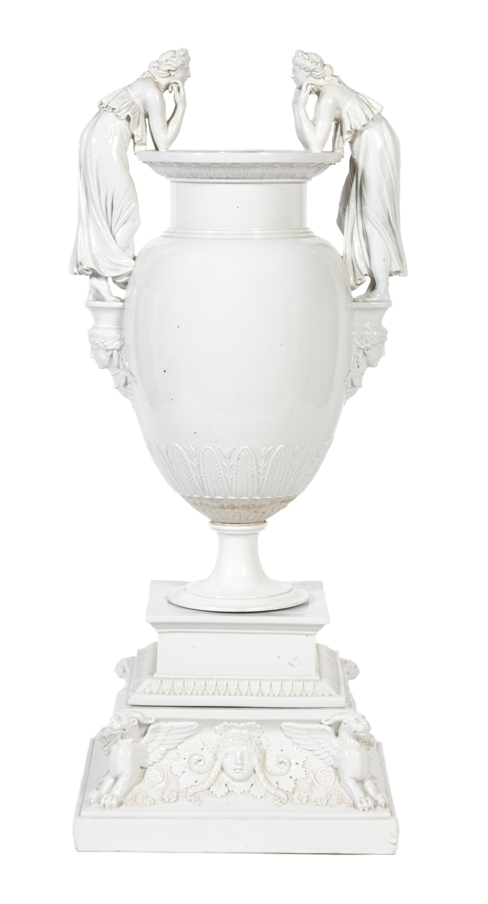 A French Glazed Porcelain Urn Height 39 inches. — 19TH CENTURY