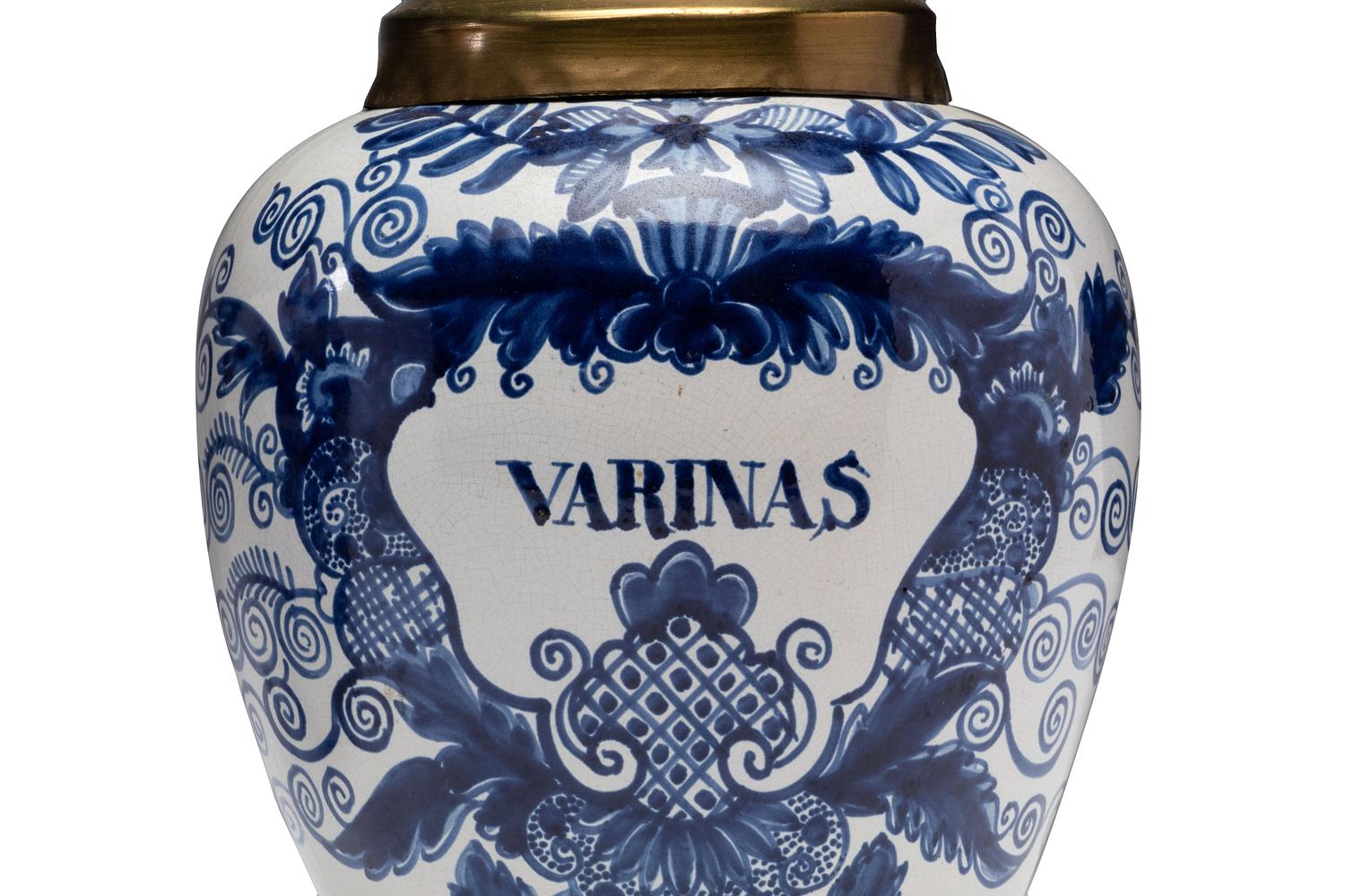 A Pair of Delft Lidded Tobacco Jars