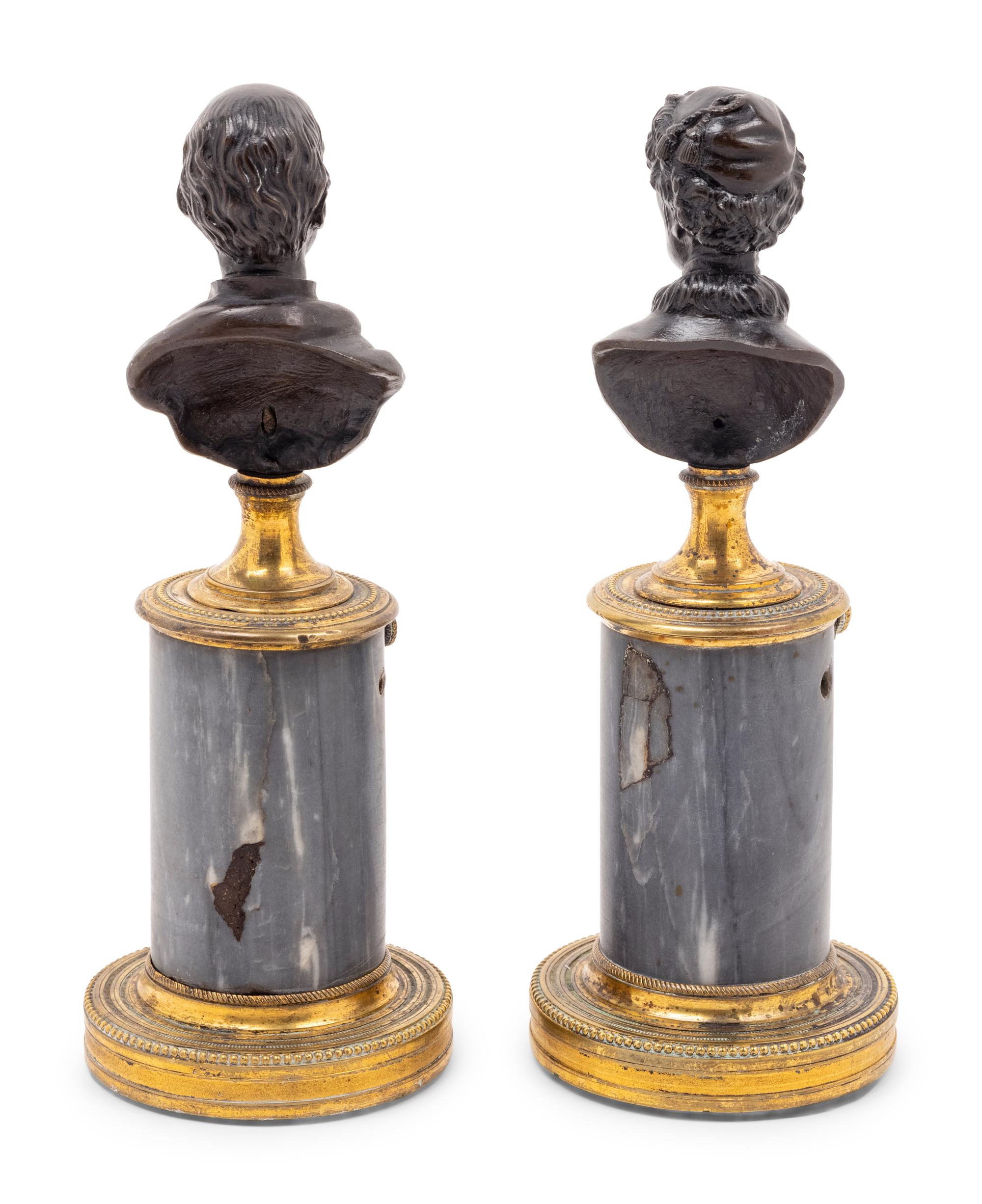 A Pair of French Bronze and Marble Small Busts of Voltaire and Rousseau
