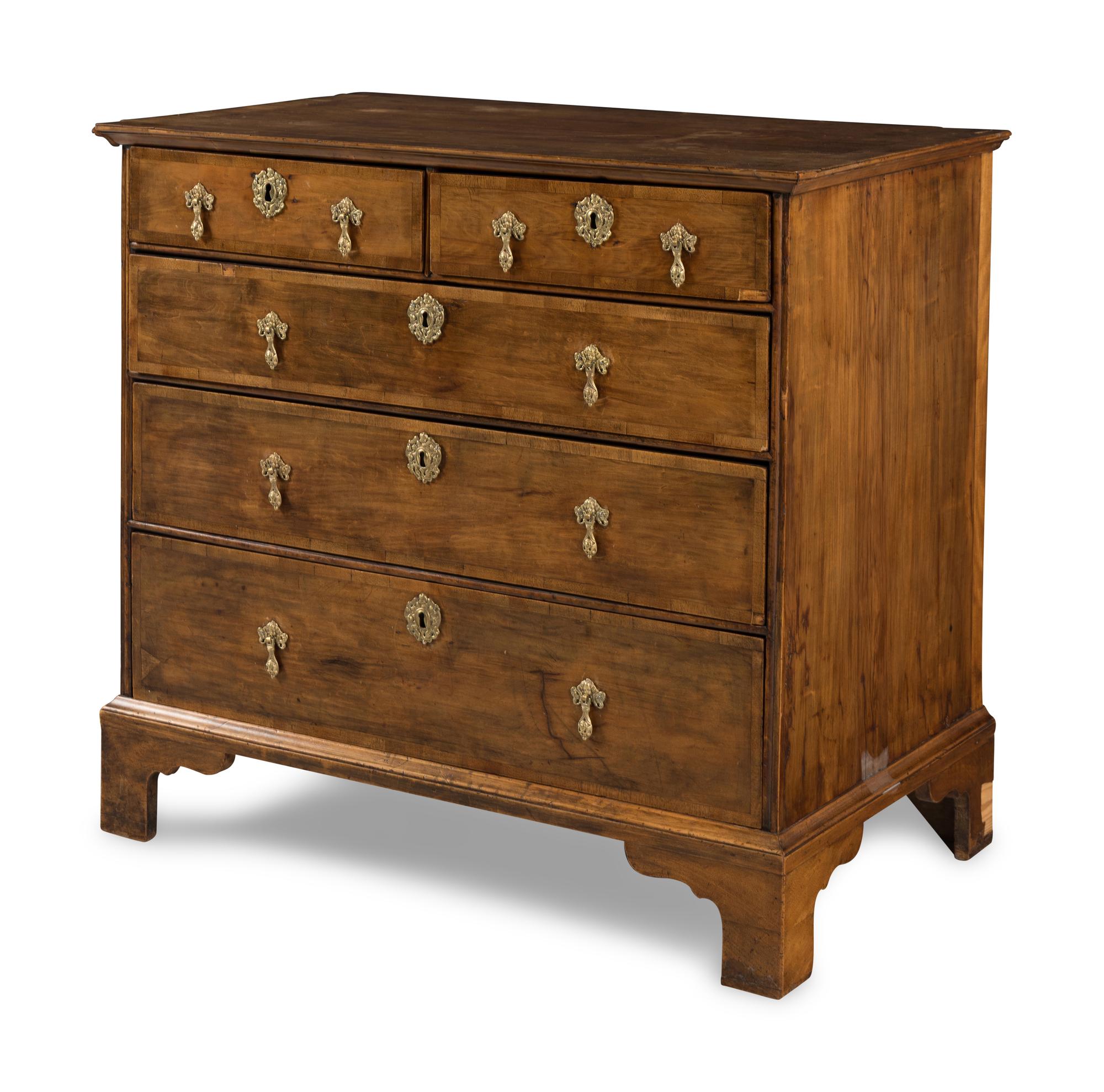 A George II Walnut and Mahogany Chest of Drawers