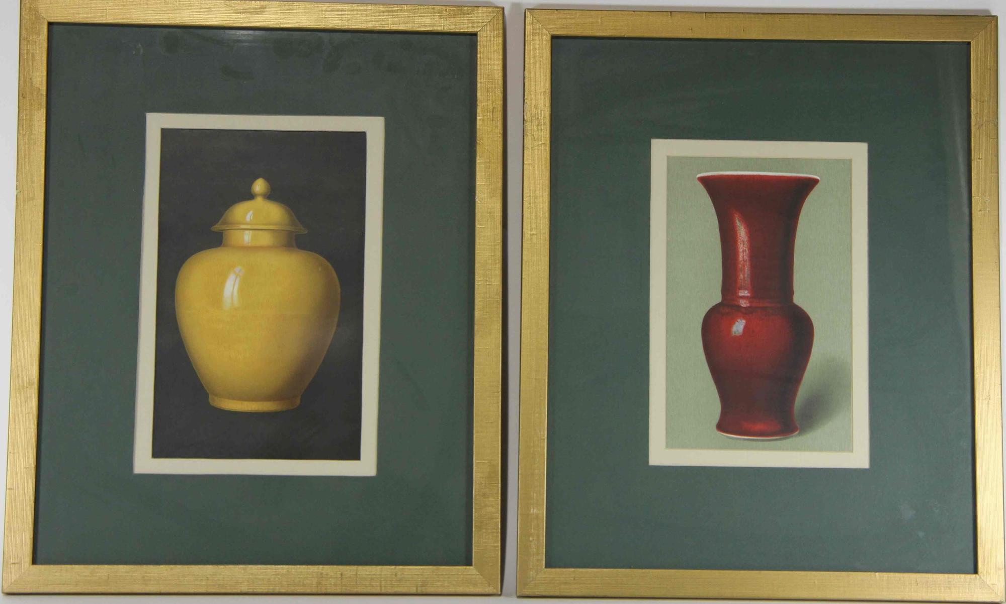 A Group of Four Ceramic Plates Height of tallest 22 1/2 inches.
