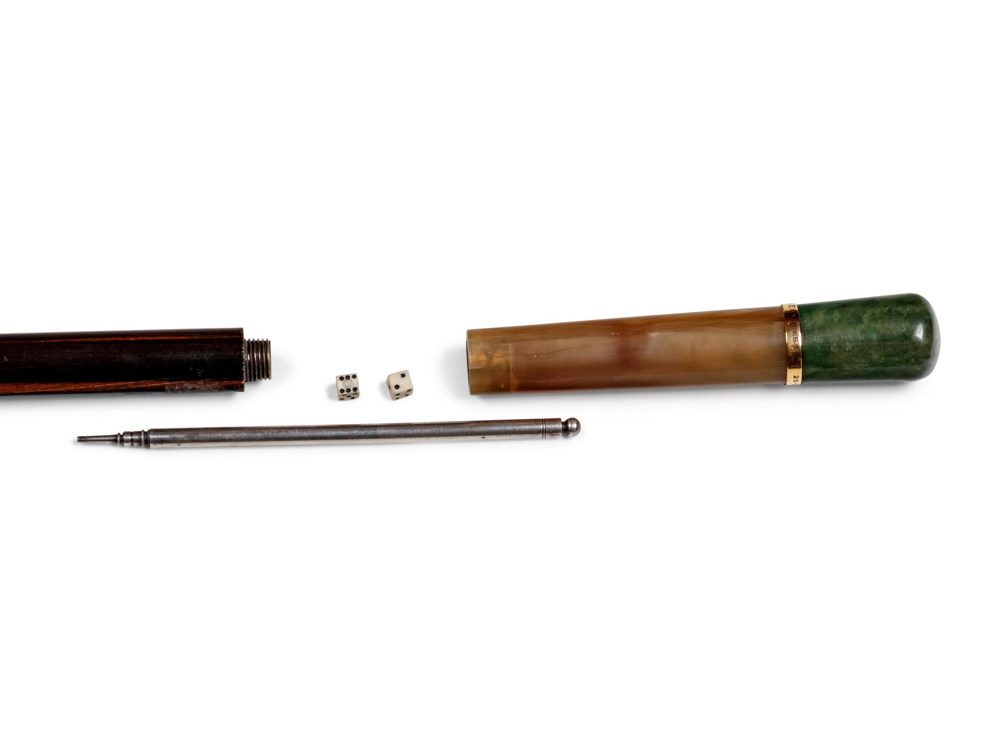 A Carved Jade and Horn Mounted Calamander Gamblers 'System' Walking Stick