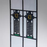 Window with cast quatrefoil medallion